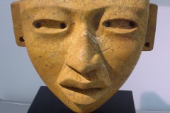 Teotihuacan: large tan colored stone mask, classic phase circa 650-200 B.C.From the region of Tlaimilolpa-Metepec, Veracruz, Mexico. Measurements 22.8cm x29cm