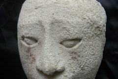 Mayan: “stucco portrait face of an unknown noble or dignitary” possibly from region of Palenque, Mexico or Petén, Guatemala, Central America; circa 600-900 A.D. Height 18cm.